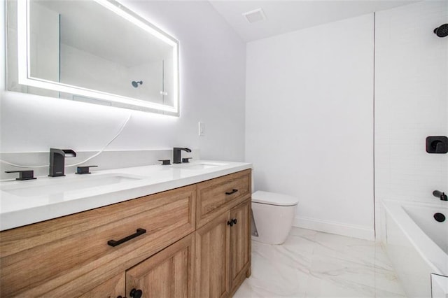 full bathroom featuring shower / tub combination, vanity, and toilet