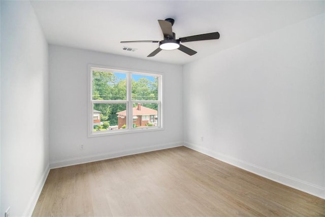 unfurnished room with ceiling fan and light hardwood / wood-style floors