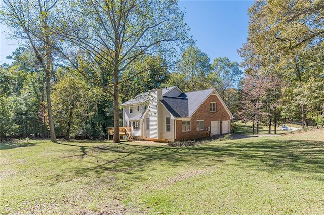 view of property exterior featuring a garage and a lawn