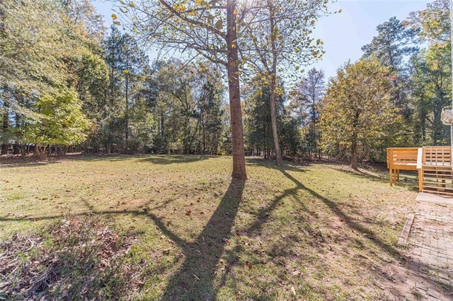 view of yard with a deck