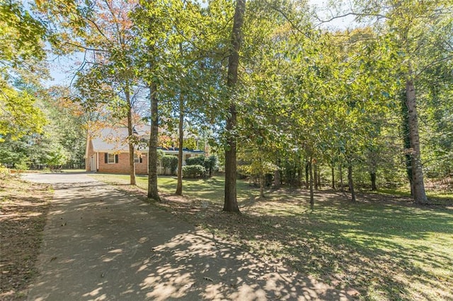 exterior space featuring a front lawn