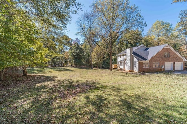 view of yard with a garage