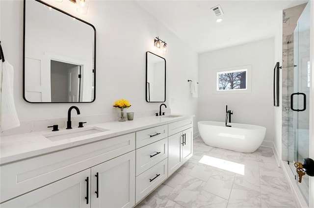 full bath featuring a sink, visible vents, marble finish floor, and a shower stall