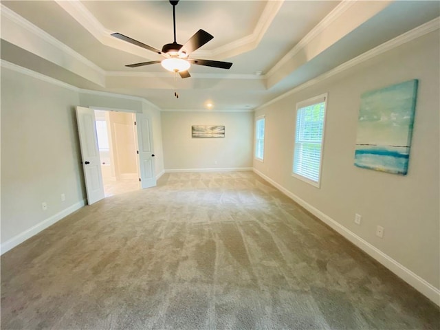 1540 Ox Bridge Ct, Lawrenceville, GA 30043 - carpeted empty room with a raised ceiling, ornamental molding, a ceiling fan, and baseboards