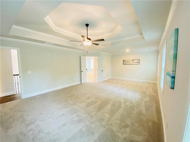 1540 Ox Bridge Ct, Lawrenceville, GA 30043 - carpeted spare room featuring a raised ceiling, ceiling fan, crown molding, and baseboards
