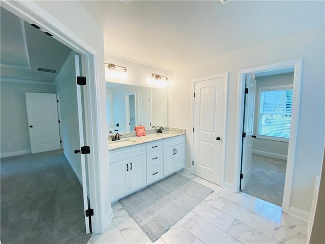 1540 Ox Bridge Ct, Lawrenceville, GA 30043 - bathroom featuring double vanity, baseboards, and marble look tile flooring