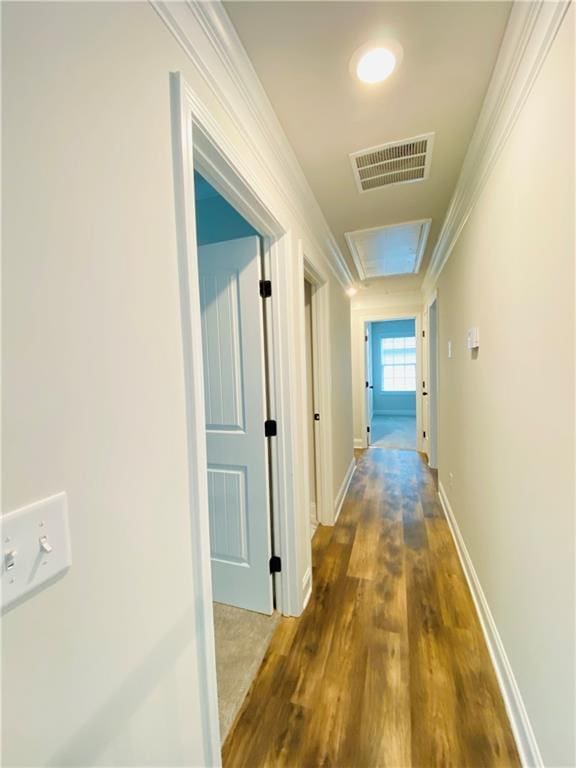 1540 Ox Bridge Ct, Lawrenceville, GA 30043 - hallway with wood finished floors, attic access, baseboards, and ornamental molding