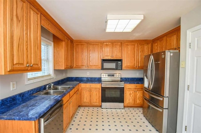 kitchen with sink and stainless steel appliances