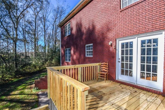 wooden terrace featuring french doors