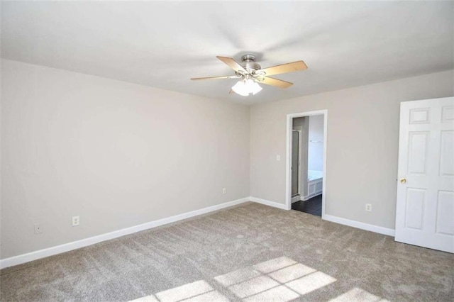 unfurnished room with carpet floors and ceiling fan