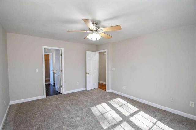 unfurnished bedroom with carpet flooring and ceiling fan