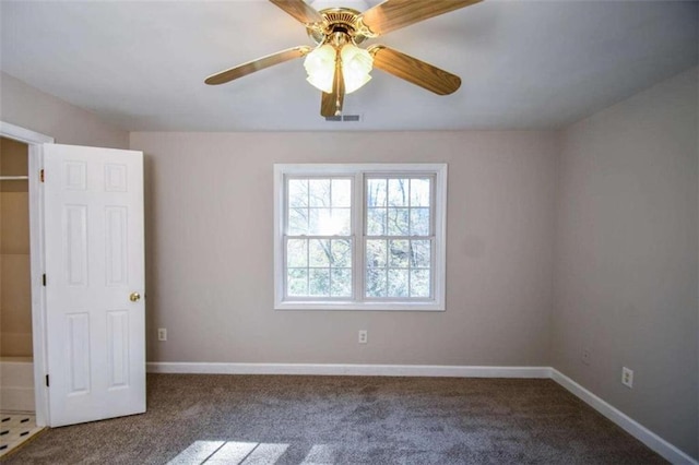 carpeted empty room with ceiling fan