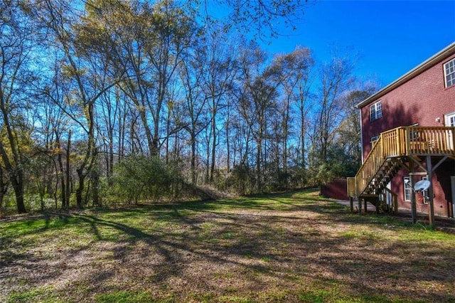 view of yard featuring a deck