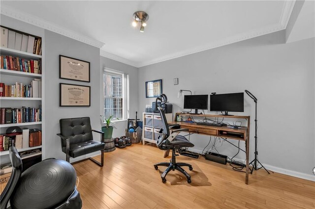 199 14th St NE Unit 2010, Atlanta, GA 30309 - office area featuring baseboards, ornamental molding, and hardwood / wood-style floors