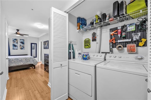 199 14th St NE Unit 2010, Atlanta, GA 30309 - laundry area with ceiling fan, laundry area, light wood-style floors, ornamental molding, and washer and clothes dryer