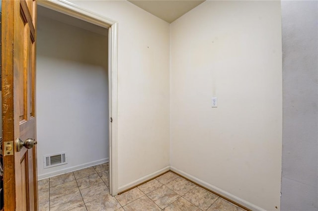 1850 Francis Rd SW, Conyers, GA 30094 - empty room with baseboards, visible vents, and light tile patterned floors