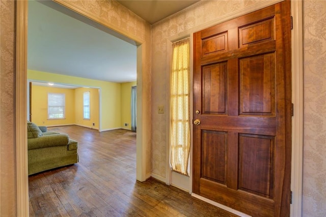 1850 Francis Rd SW, Conyers, GA 30094 - foyer entrance with baseboards, dark wood finished floors, and wallpapered walls
