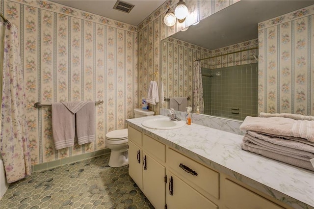 1850 Francis Rd SW, Conyers, GA 30094 - full bathroom with vanity, toilet, baseboards, visible vents, and tiled shower
