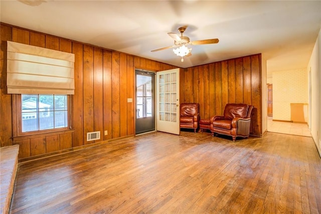1850 Francis Rd SW, Conyers, GA 30094 - sitting room with visible vents, a ceiling fan, wood finished floors, and a healthy amount of sunlight