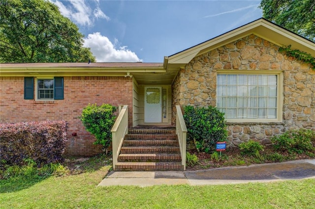 1850 Francis Rd SW, Conyers, GA 30094 - entrance to property featuring a lawn, brick siding, and stone siding