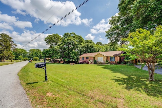 1850 Francis Rd SW, Conyers, GA 30094 - view of front of home featuring a front lawn and stone siding