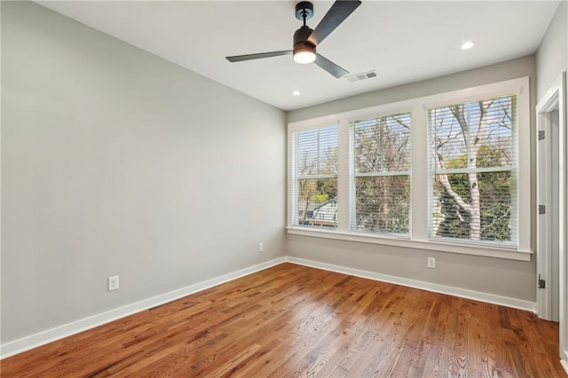 1095 Tucker Ave Unit 408, Atlanta, GA 30310 - unfurnished room with a ceiling fan, wood finished floors, baseboards, visible vents, and recessed lighting