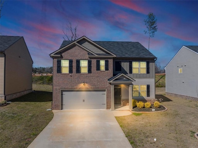 view of front facade featuring driveway, a yard, board and batten siding, an attached garage, and brick siding