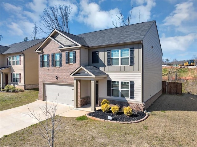 craftsman-style house featuring fence, an attached garage, concrete driveway, board and batten siding, and brick siding