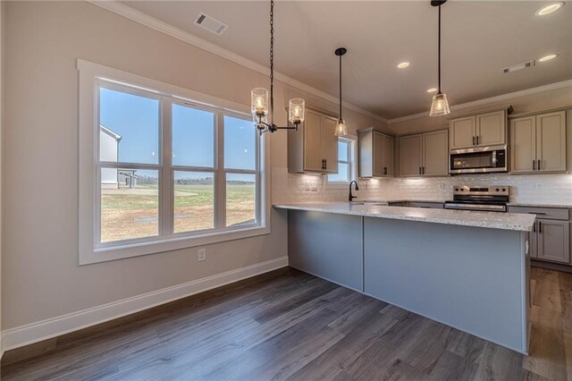 kitchen featuring visible vents, appliances with stainless steel finishes, gray cabinetry, and decorative backsplash