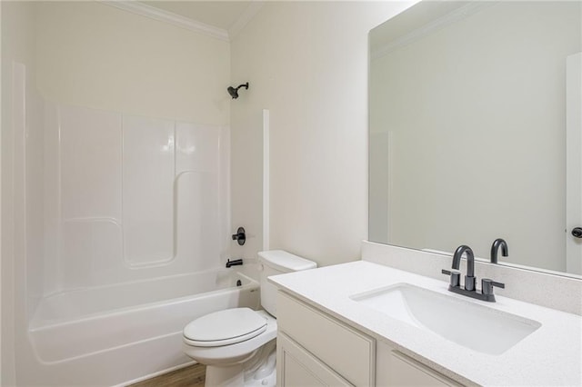 bathroom with vanity, crown molding, toilet, and tub / shower combination