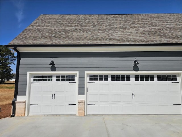 garage featuring driveway