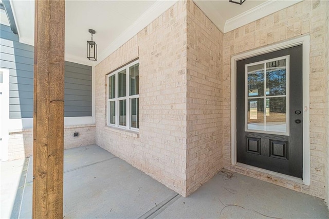 doorway to property with a porch