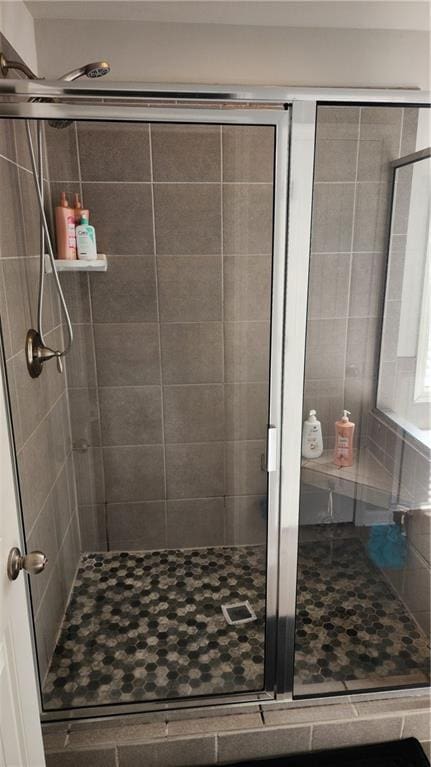 bathroom featuring a stall shower