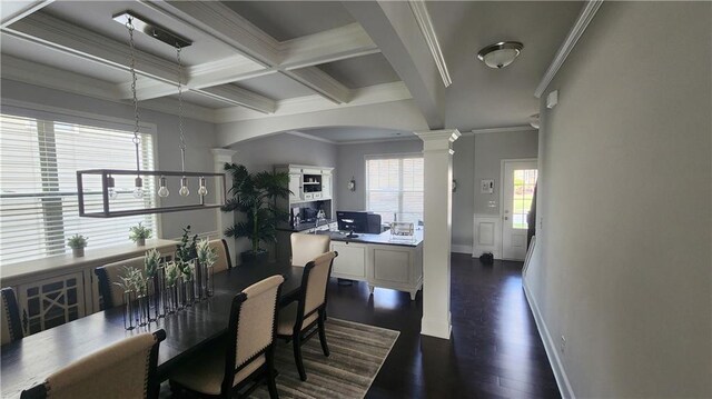 dining room with crown molding, beamed ceiling, coffered ceiling, dark wood-style flooring, and decorative columns