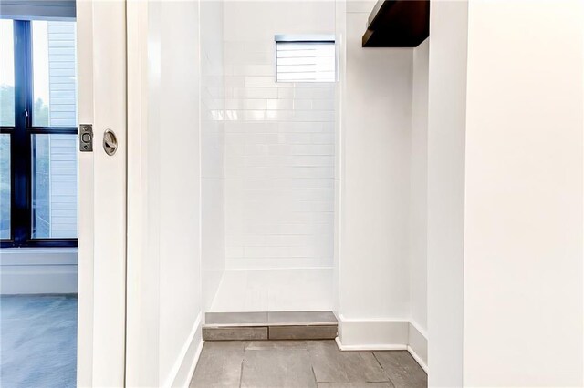 full bathroom with shower / bath combination with curtain, vanity, tile patterned floors, and toilet