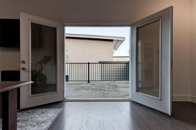 interior space featuring dark hardwood / wood-style floors and french doors