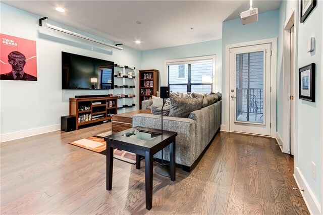 corridor featuring hardwood / wood-style flooring