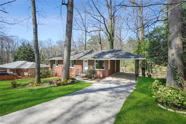 ranch-style home featuring a carport, concrete driveway, a front lawn, and brick siding