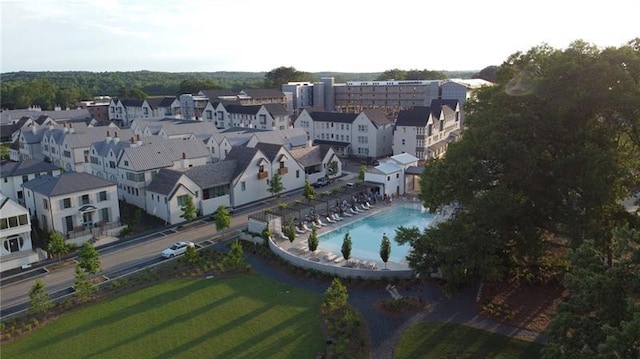 birds eye view of property with a residential view