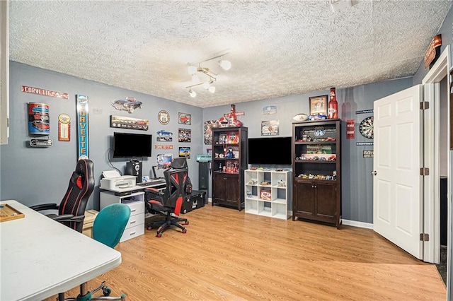 6355 Queens Rd, Douglasville, GA 30135 - office area with a textured ceiling and wood finished floors