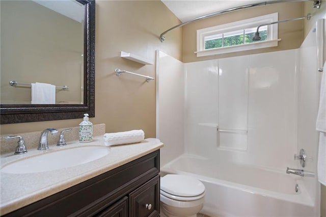 full bathroom featuring toilet,  shower combination, and vanity