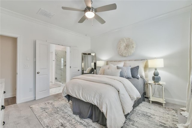 bedroom featuring connected bathroom, carpet floors, visible vents, baseboards, and ornamental molding