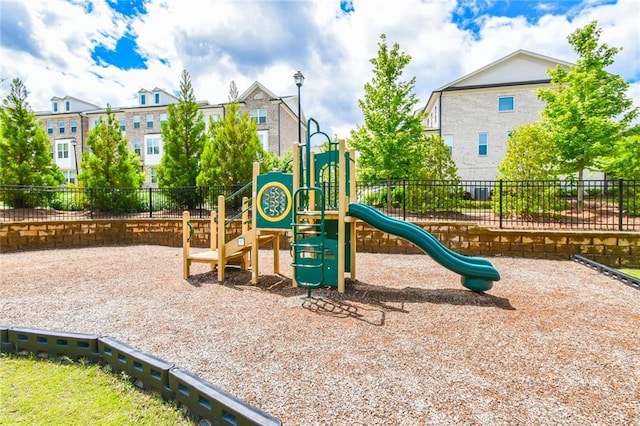 community playground featuring fence