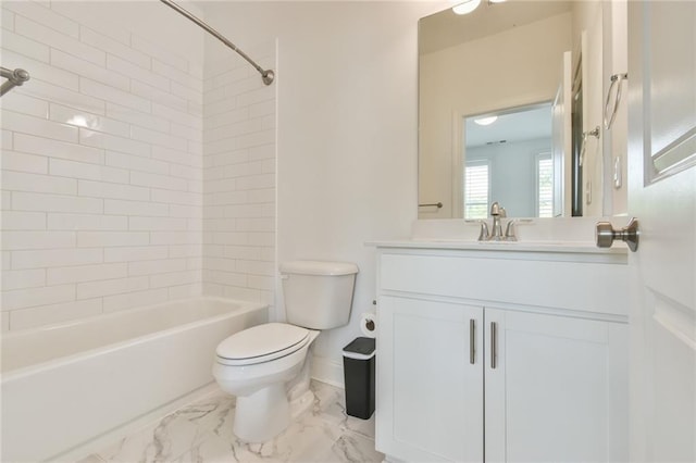 full bathroom with bathtub / shower combination, toilet, marble finish floor, and vanity