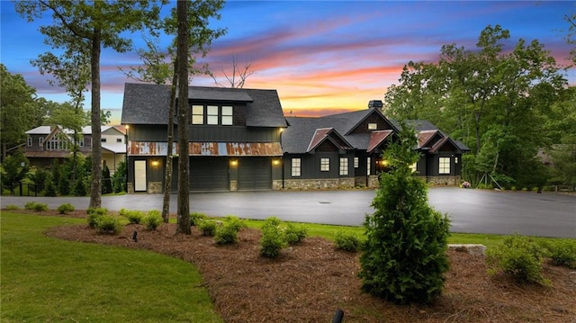 exterior space with a lawn and a garage