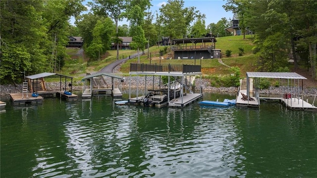 dock area with a water view