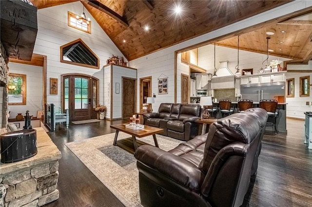 living room with wood walls, dark hardwood / wood-style flooring, wood ceiling, and high vaulted ceiling