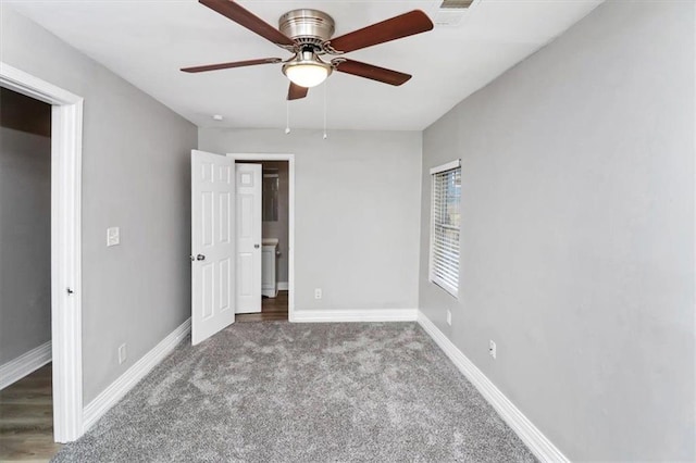 2222 Mcafee Rd, Decatur, GA 30032 - unfurnished bedroom with ceiling fan and carpet floors