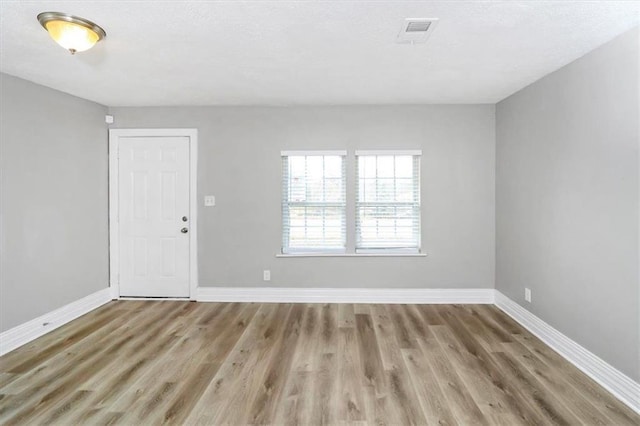 2222 Mcafee Rd, Decatur, GA 30032 - unfurnished room featuring hardwood / wood-style floors