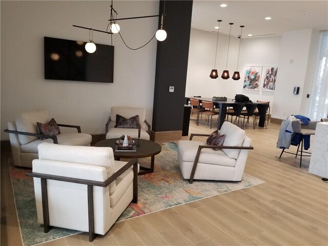 living room with light hardwood / wood-style floors